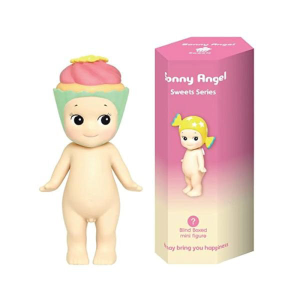A cherubic figurine with a cupcake hat next to its packaging labeled "Sonny Angel Sweets Series."
