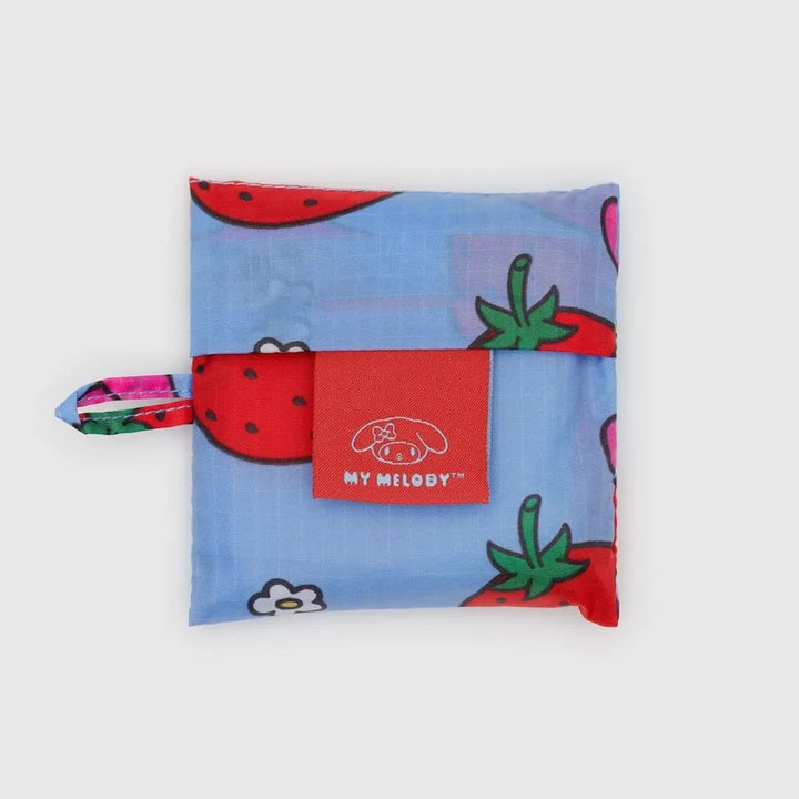 Colorful pouch with strawberry design and "MY MELODY" tag on a white background.