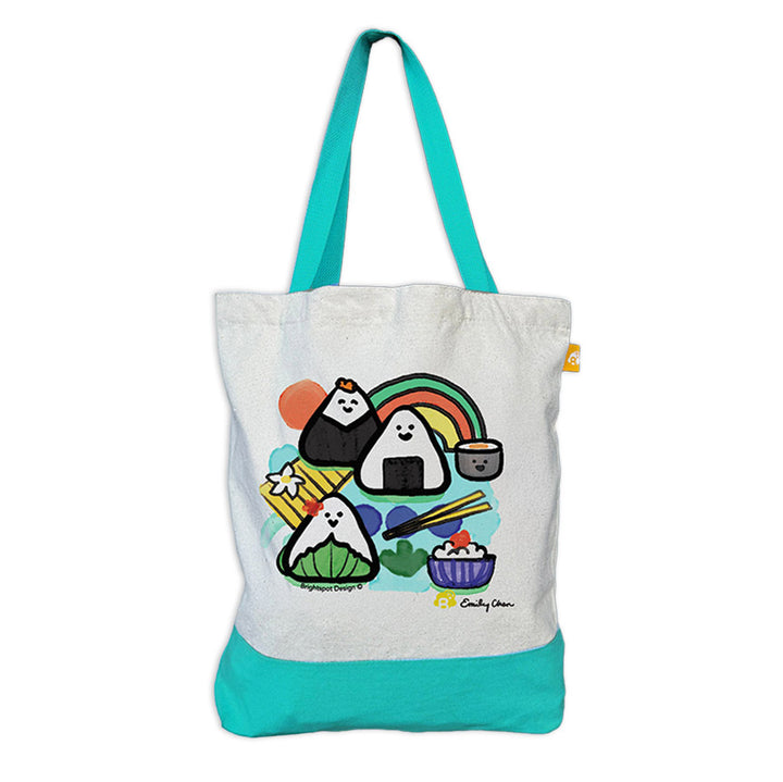 Tote bag with onigiri rice ball design on a white background with blue straps and trim.