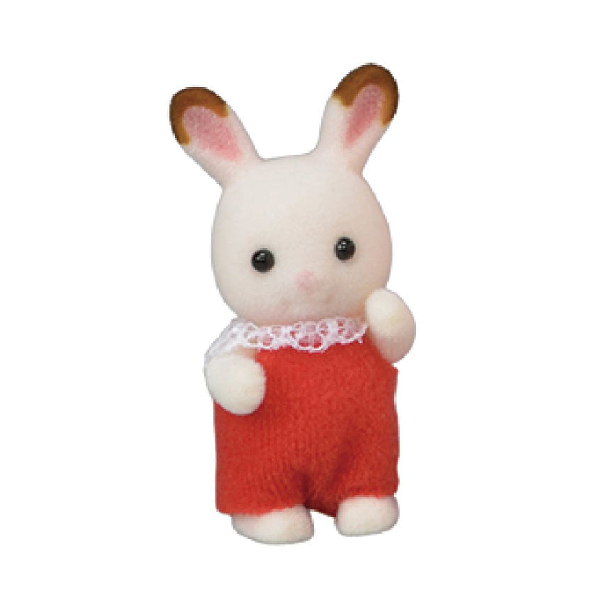 A flocked white rabbit figure with brown-tipped ears in a red outfit with white lace frill collar. With one arm up.