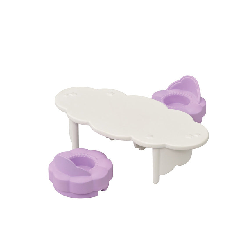A small white cloud-shaped table or tray set with two lavender flower-shaped cup chairs, shown on a plain white background. This table also converts into a cart. 