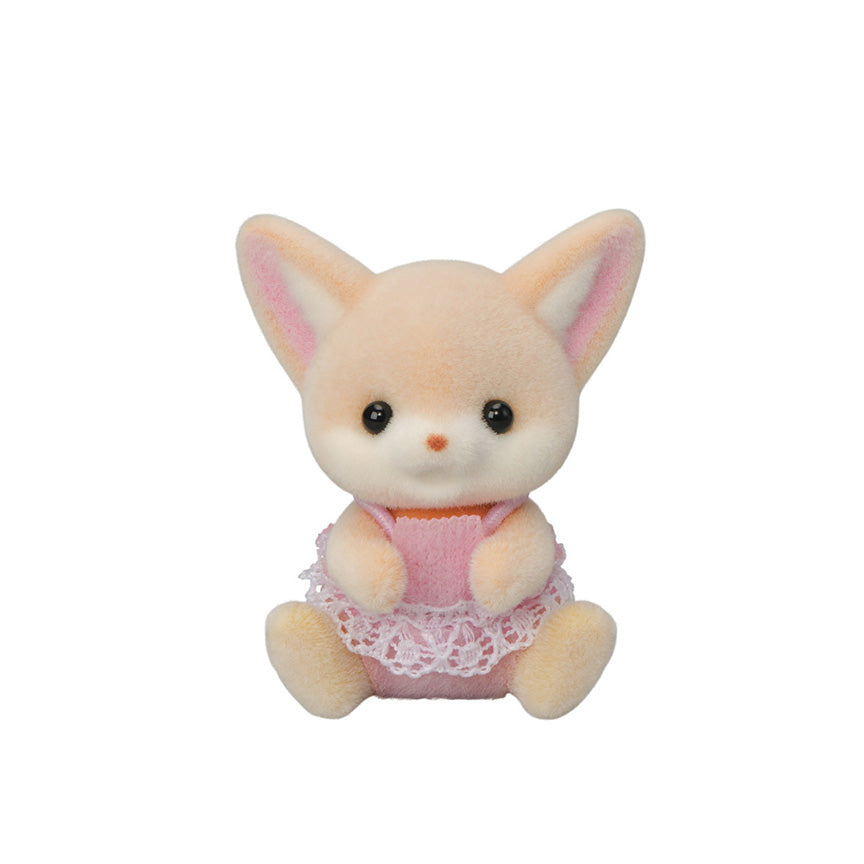 Tan and white, flocked baby fennec fox figurine sitting. Wearing a pink outfit with white frills on it. 