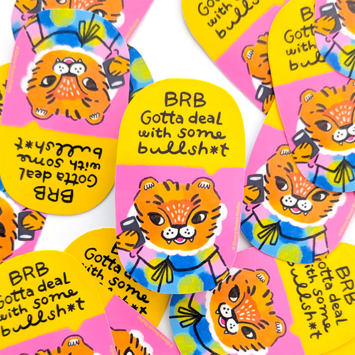 Stickers with a cartoon tiger and text on colorful background.