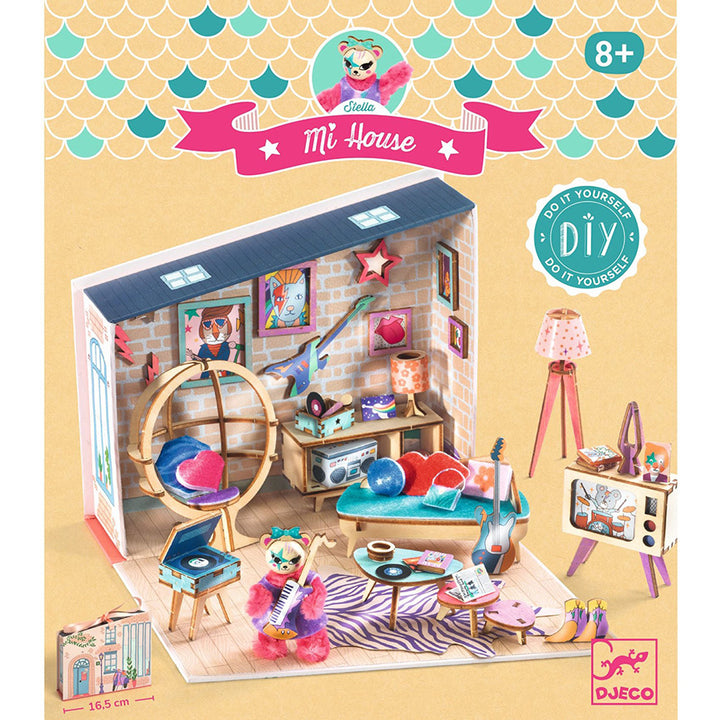 Djeco toy apartment set with various punk-rock furniture and decorations on a tan background