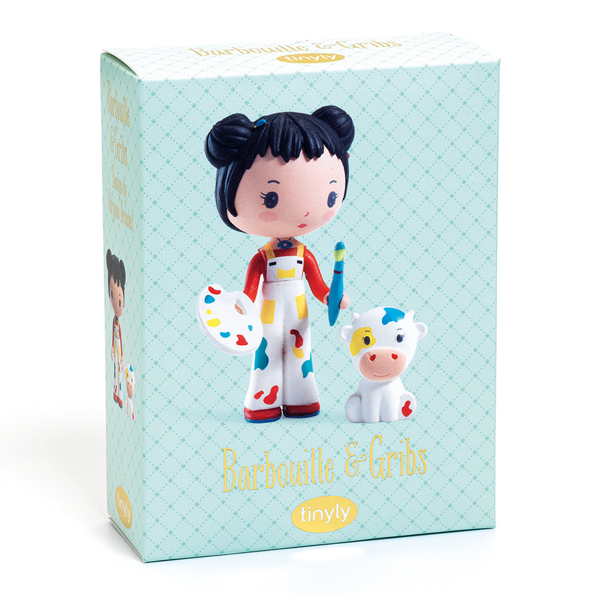 Toy packaging for Barbouille and Gribs, featuring a photo of the dolls with text  reading "Barbouille & Gribs" with the Tinyly logo underneath against a pale teal background. 