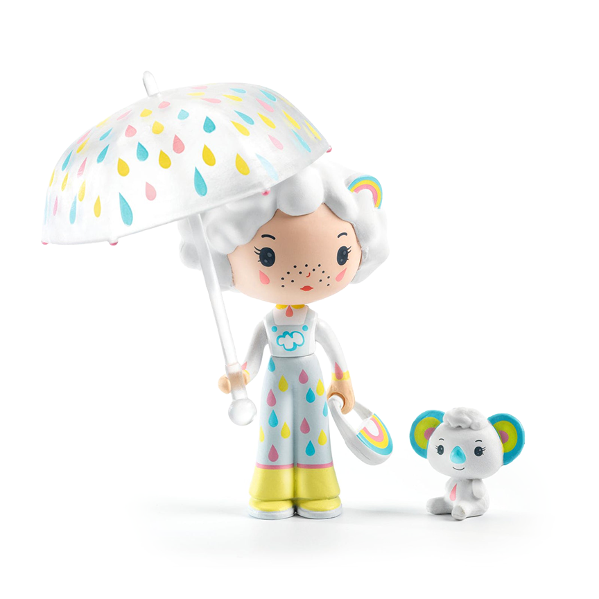 A toy figurine with pale, freckled skin and white hair carrying an umbrella and purse outfitted with pastel-colored raindrops and rainbows. To her side, a small white panda with a blue nose. Figurines are displayed on a white background. 