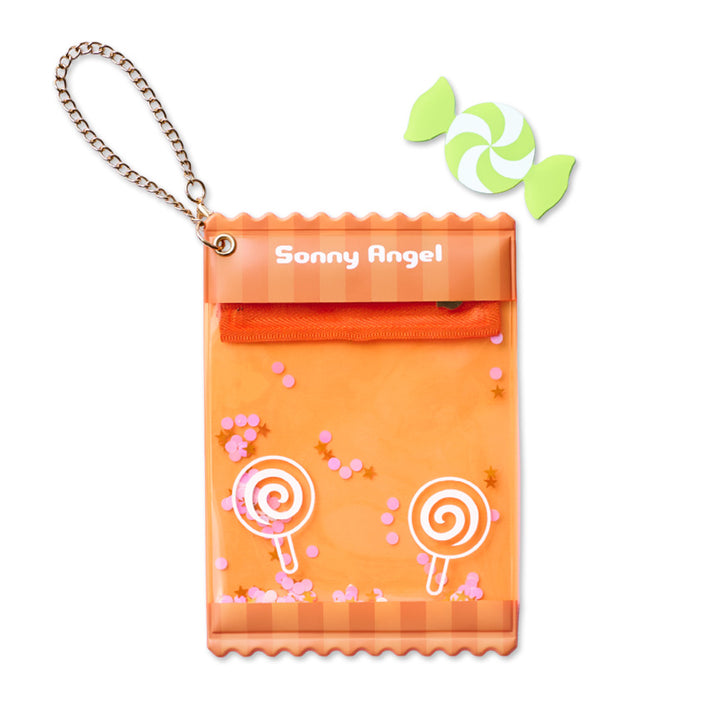 An orange candy-themed mini-figure holder pouch with a gold chain strap, featuring &