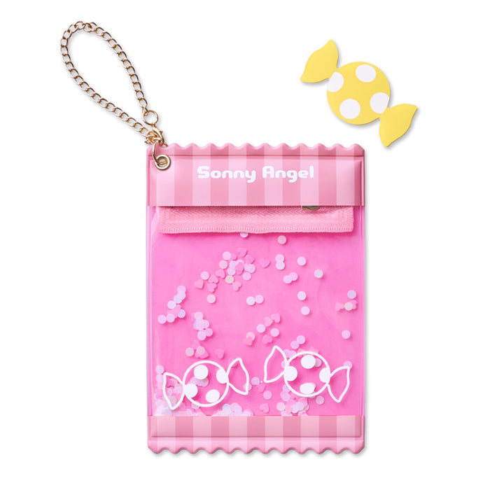 A pink candy-themed mini-figure holder pouch with a gold chain strap, featuring &