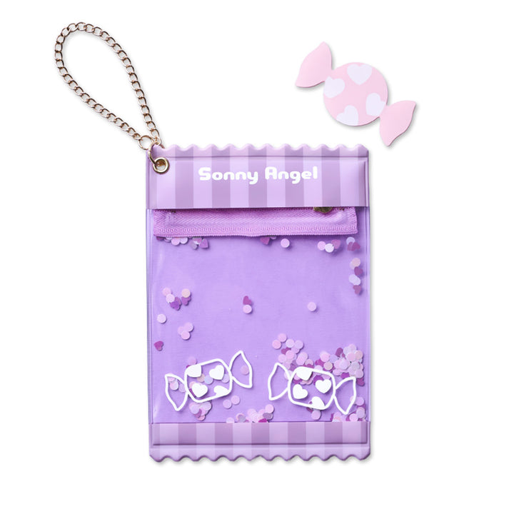 A purple candy-themed mini-figure holder pouch with a gold chain strap, featuring &