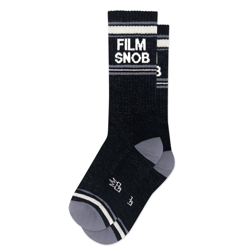 Black, white, and gray retro gym-style crew socks with the text 'Film Snob' on a white background.