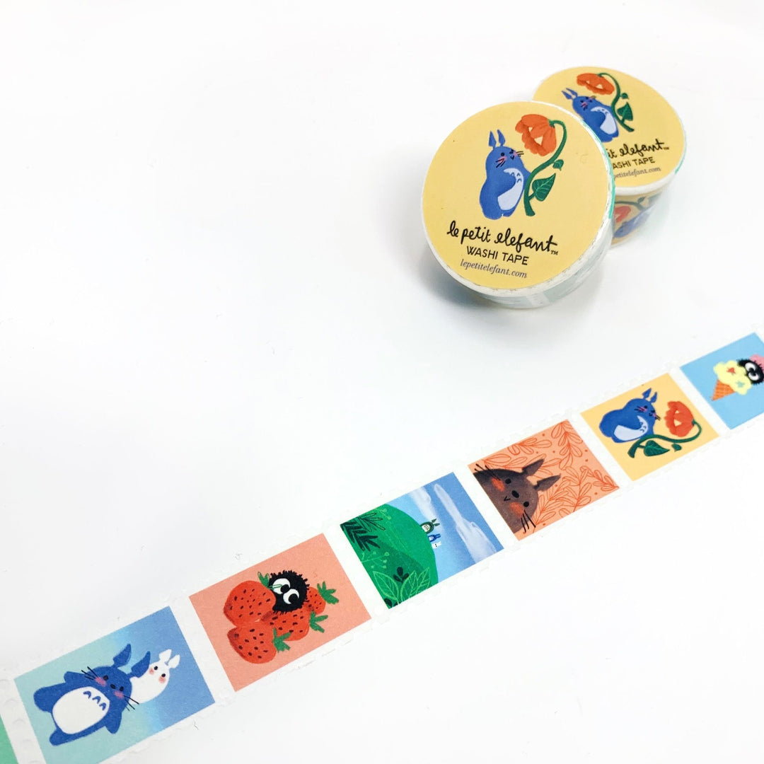 Set of colorful Totoro-themed washi tape rolls on a white background.