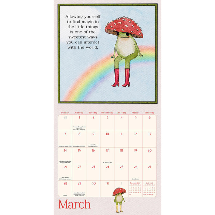 A whimsical March wall calendar page featuring a whimsical frog wearing a red mushroom hat and red boots sitting on a rainbow, with a monthly calendar grid below.
