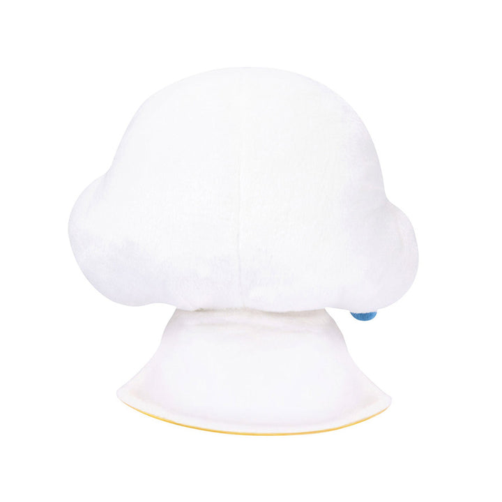 Back view of a plush of a girl with white skin and rainbow hair wearing a smiling cloud hat, white cape, and blue cloud outfit. 