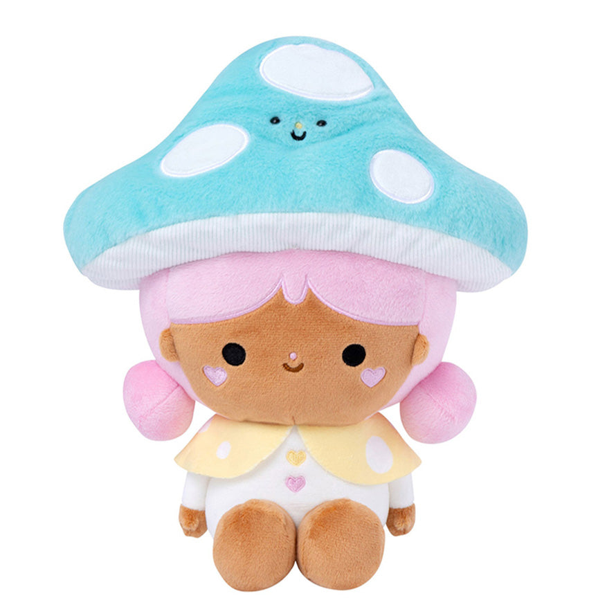 Plush of a girl with brown skin and pink hair wearing smiling blue mushroom hat and yellow and white outfit. 