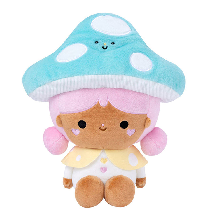 Plush of a girl with brown skin and pink hair wearing smiling blue mushroom hat and yellow and white outfit. 