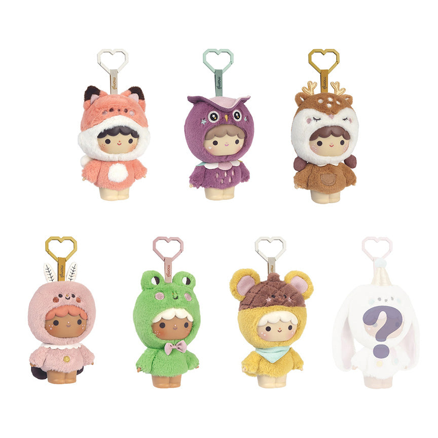 Six plush character keychains arranged in two rows on a white background, plus one barely shown mystery keychain design. Each keychain features a small human character in a different animal costume: fox, owl, reindeer, moth, frog, and squirrel.