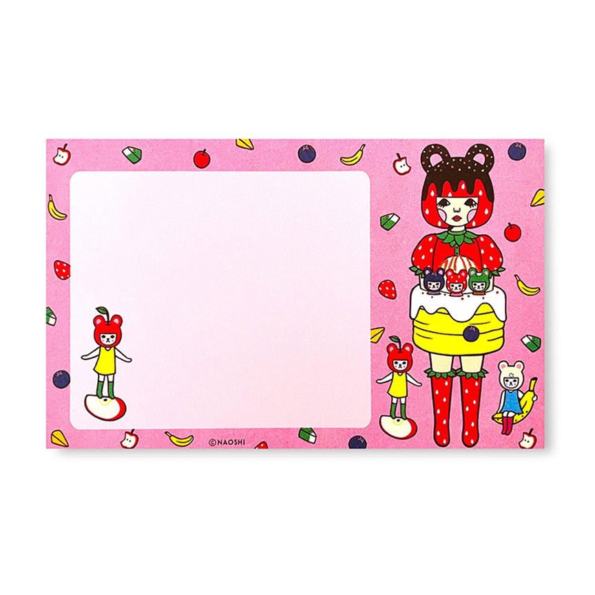 A colorful notepad with a bear design, featuring various cartoon bears, fruits, and the space for writing on a pink background.