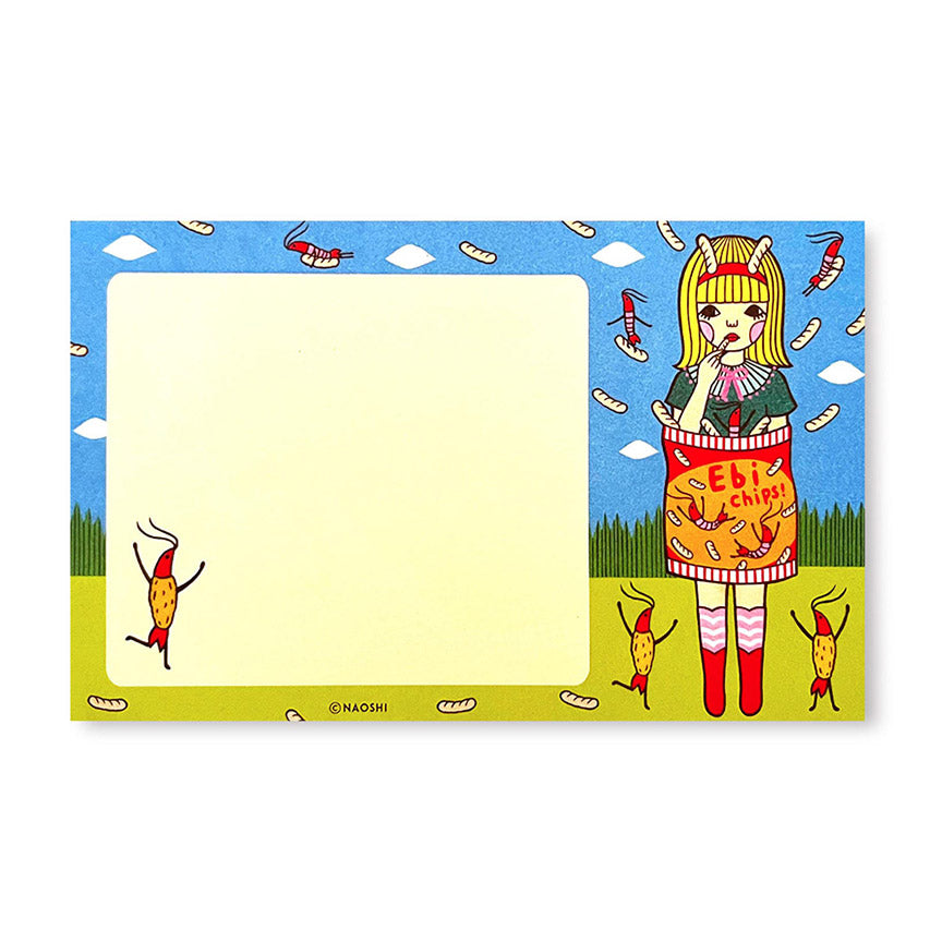A colorful notepad with an illustration of a girl inside an "Ebi Chips" bag, surrounded by small shrimp creatures on a blue sky background.