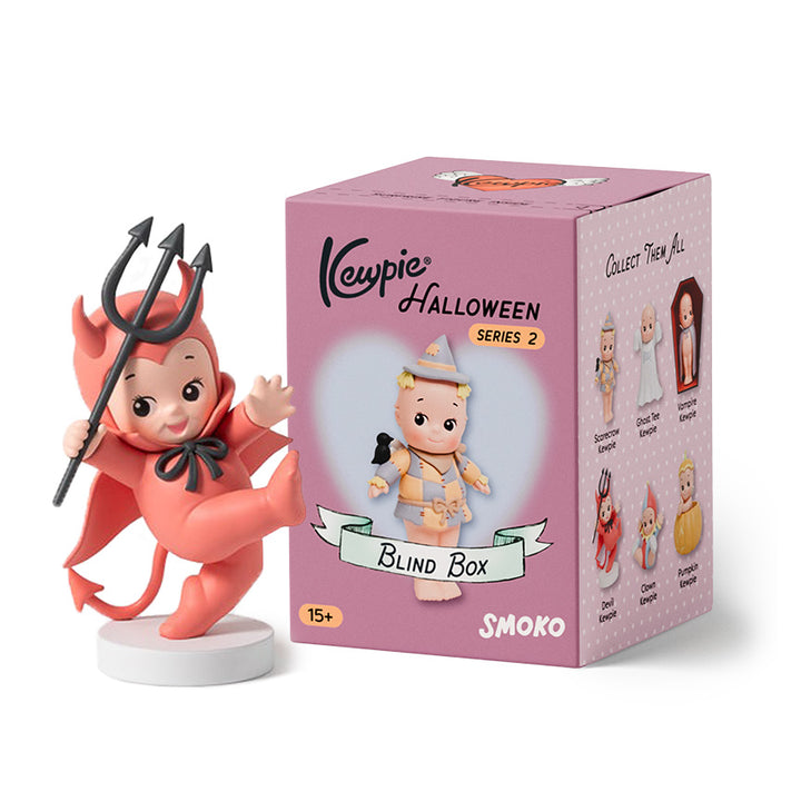 Kewpie figure next to it&