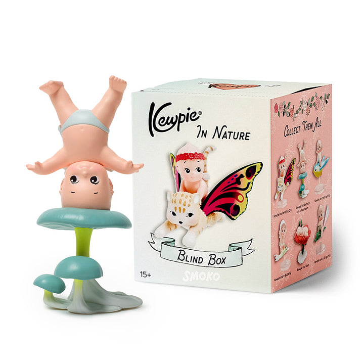 Kewpie figure next to it&