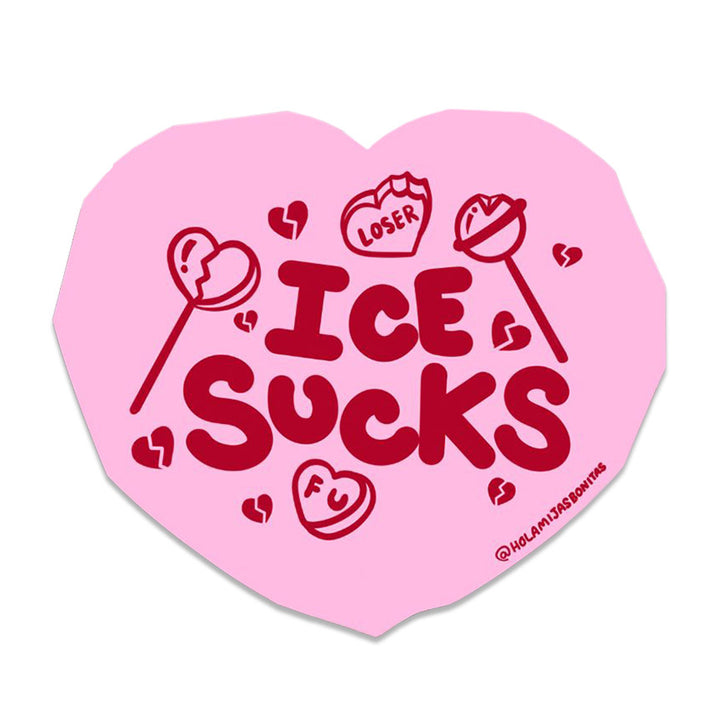 Heart-shaped pink sticker with red text &